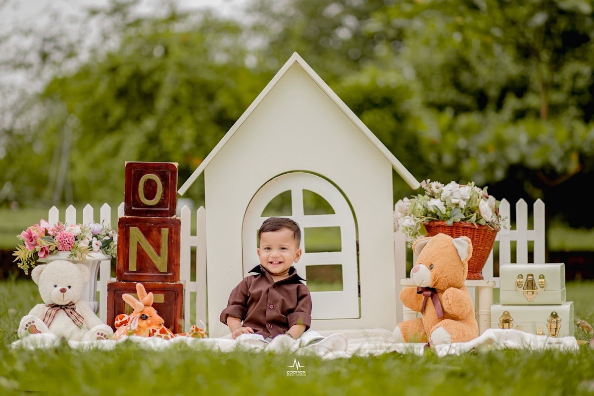 A child's pre-birthday photoshoot setup at Zoomax Studio, Bekal Beach Park