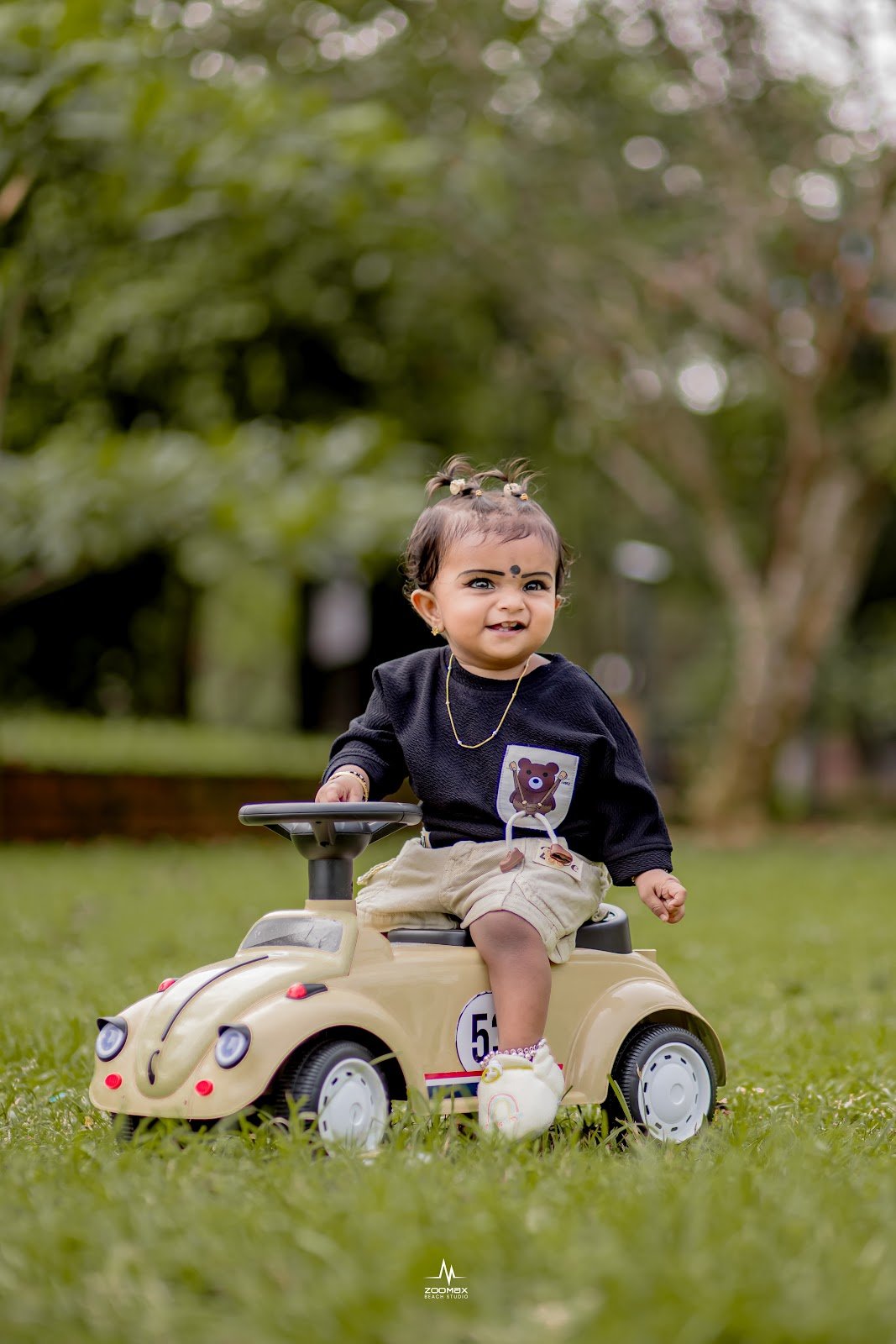 Birthday-themed toy car photoshoot setup